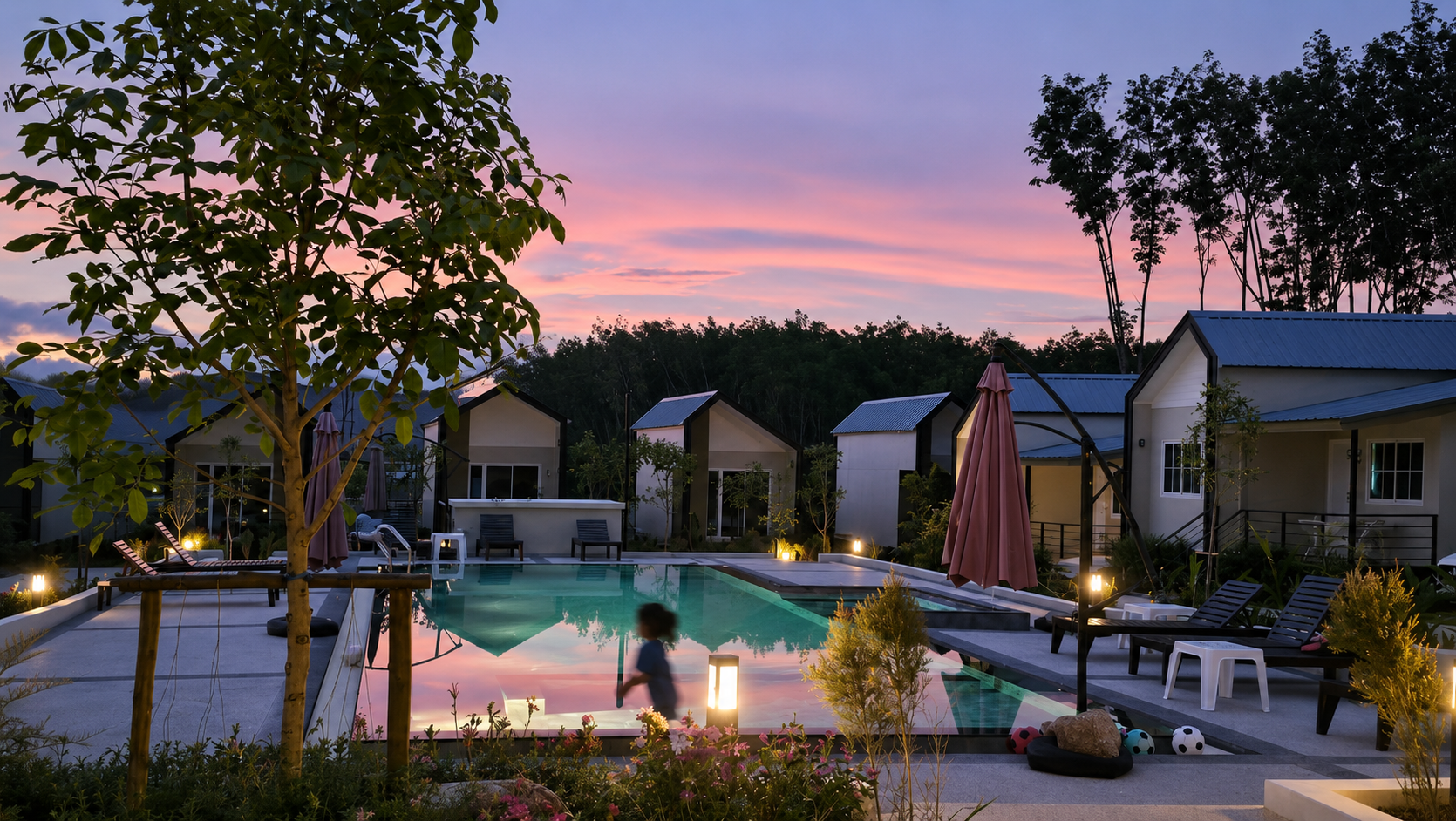 NaraRin pool at dusk with the mountains behind