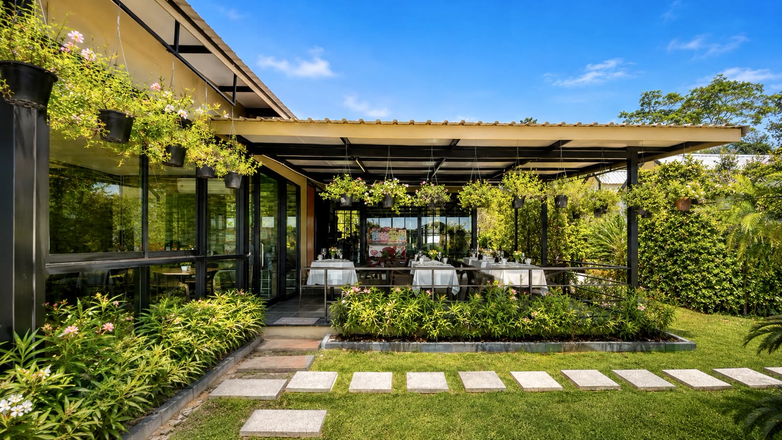 Covered garden terrace dining at the NaraRin Phuket restaurant